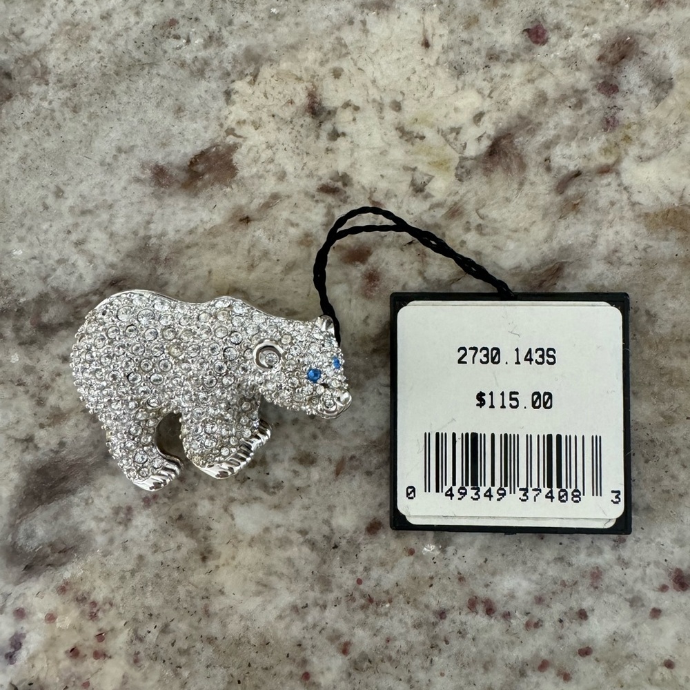 NWT Swarovski polar bear pin with blue crystal eyes
